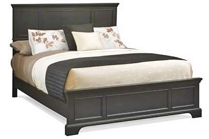 Sleigh type wooden bed