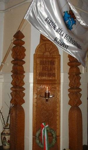 Inside of the church, focus on his name plaque