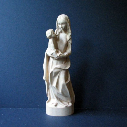 This Madonna, most probably carved of larch wood, was made by and purchased from a woodcarver in the village of Chocholow.  Small statues like these are easy enough to carry, wrapped in tissue, in a camera bag or backpack.