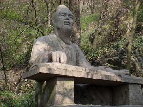 Okay, this is the gospel truth.  This is a statue showing the rock where one of the emperor's childhood friends used to sit and player the zither.