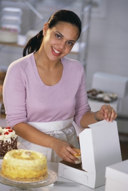 Woman Opening Cake Package
