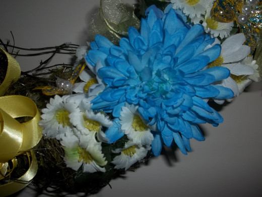 Add smaller flowers around larger ones creating mini bouquets