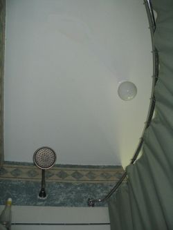 The curved shower curtain rod increases space in the shower