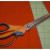 Use pinking shears to cut the triangle pennants. Cutting with pinking shears will help keep the material from fraying. Use pinking shears to cut the triangle pennants. Cutting with pinking shears will help keep the material from fraying.
