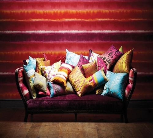 Many colors from the 2013 'Bold, Bright &amp; Beautiful' color and design trend can be seen in this single image, which features Harlequin fabrics and wallcoverings.  While using so many colors may suit some, it may be too much for others.  Do what i