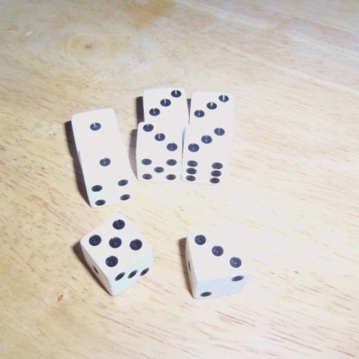 But let's say you rolled the 4's and got a 3 &amp; 5.  You now have 750 pts shown here. 5 of 3's = 500 pts 2 of 1's = 200 and 1 of 5's = 50 pts.  Wow!  You used all the dice by making points and get to roll all 8 again, even if this was the 3rd roll