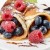 Blueberry crapes with raspberries.