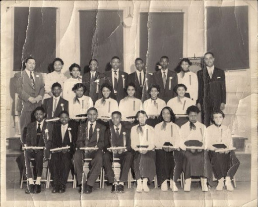Eighth grade graduation. Dad is on the front row, second from the left.