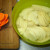 Slice the potatoes, keeping the white potatoes in salt water to prevent blackening.