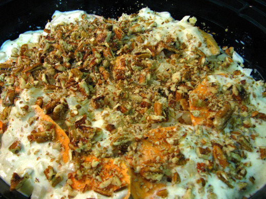 Add remaining dairy mixture, topping up with milk if necessary, then add crushed pecans.