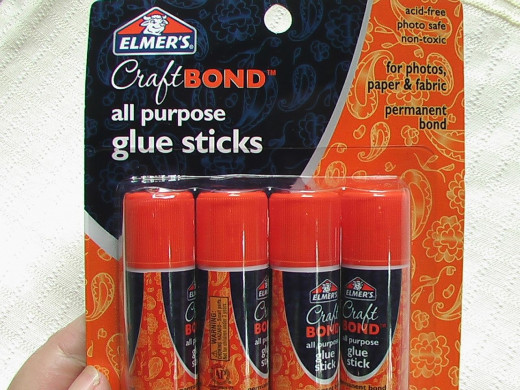 Glue sticks are used in all kinds of projects, like a Disney Memory Book!