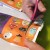 I made a copy of the stickers of Halloween faces. I found one that was a good size that would cover the face of my grandson. Then I cut it out, leaving a "tab" at the top of the mask. I made a copy of the stickers of Halloween faces. I found one that was a good size that would cover the face of my grandson. Then I cut it out, leaving a "tab" at the top of the mask.