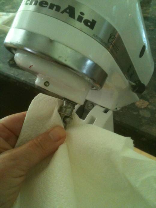 Cake batter everywhere! Use a damp cloth to clean your machine.